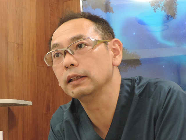 田中 拓久 院長